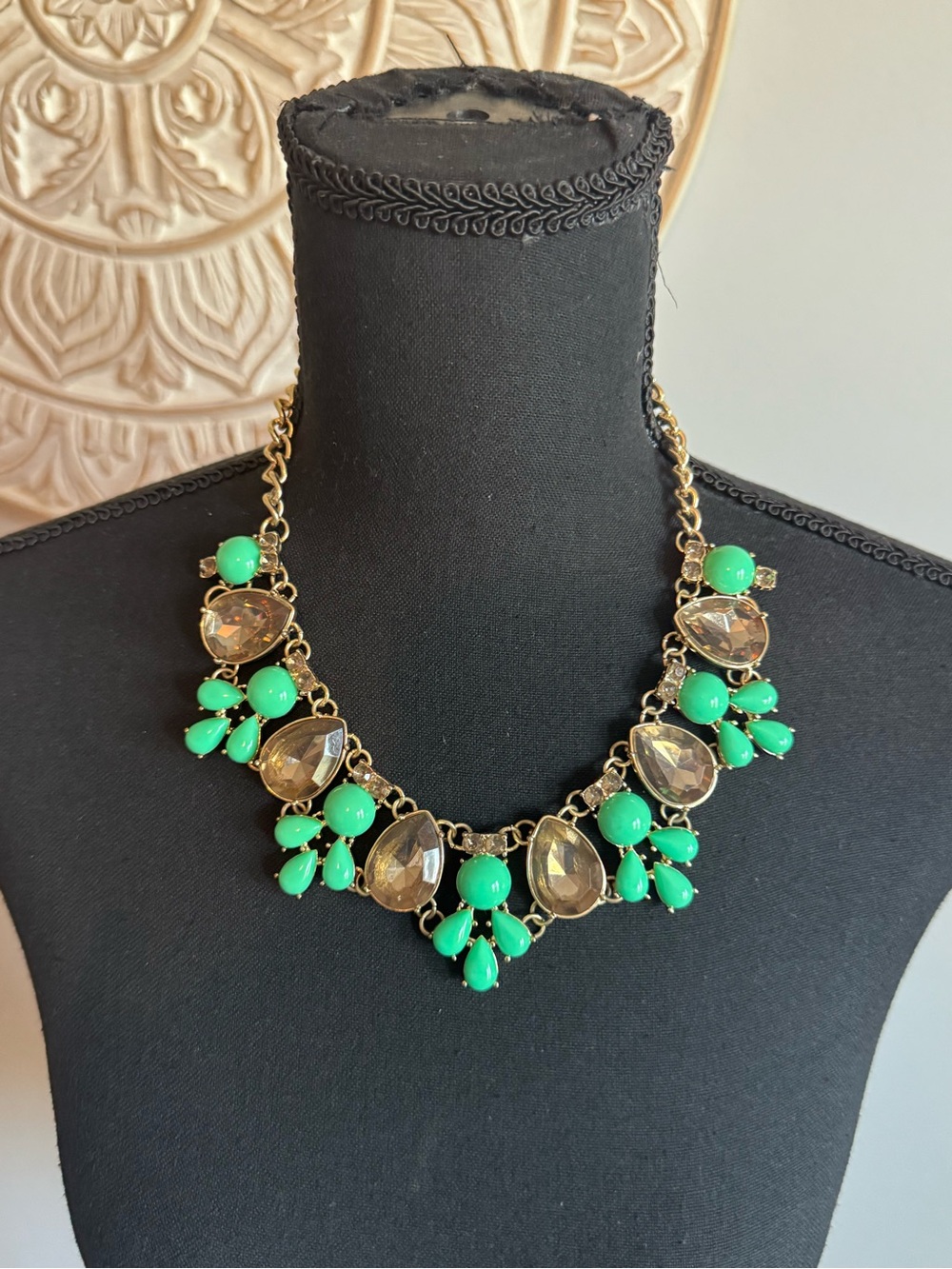 Gold-Tone Statement Necklace with Green Gem Accents